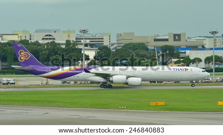 SINGAPORE - JANUARY 10: Thai Airways Airbus A340-600 quad-jet taxiing at Changi Airport on January 10, 2015 in Singapore