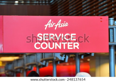 SINGAPORE - JANUARY 10:  AirAsia service counter at Changi Airport on January 10, 2015 in Singapore