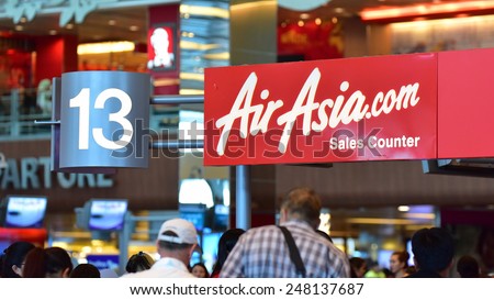 SINGAPORE - JANUARY 10:  AirAsia sales counter at Changi Airport on January 10, 2015 in Singapore