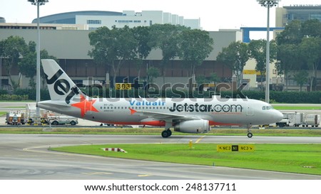 SINGAPORE - JANUARY 10:  Jetstar Asia Airbus 320 taxiing at Changi Airport on January 10, 2015 in Singapore