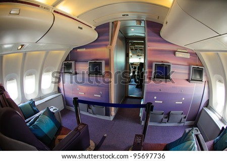 SINGAPORE - FEBRUARY 12: Top deck business class cabin in Singapore Airlines\' (SIA) last Boeing 747-400 aircraft at Singapore Airshow February 12, 2012 in Singapore