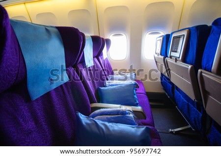 SINGAPORE - FEBRUARY 12: Economy class cabin in Singapore Airlines' (SIA) last Boeing 747-400 aircraft at Singapore Airshow February 12, 2012 in Singapore