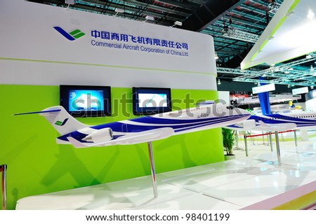 SINGAPORE - FEBRUARY 17: Commercial Aircraft Corporation of China (COMAC) ARJ21 passenger plane model on display at Singapore Airshow February 17, 2012 in Singapore