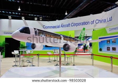 SINGAPORE - FEBRUARY 17: Commercial Aircraft Corporation of China (COMAC) C919 aircraft model on display at Singapore Airshow February 17, 2012 in Singapore