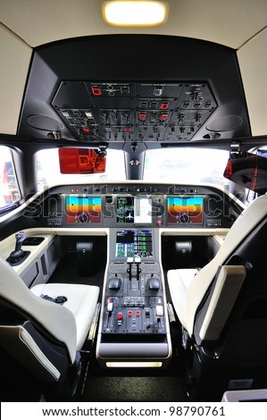 SINGAPORE - FEBRUARY 17: Cockpit of a Embraer Legacy 500 corporate jet at Singapore Airshow February 17, 2012 in Singapore
