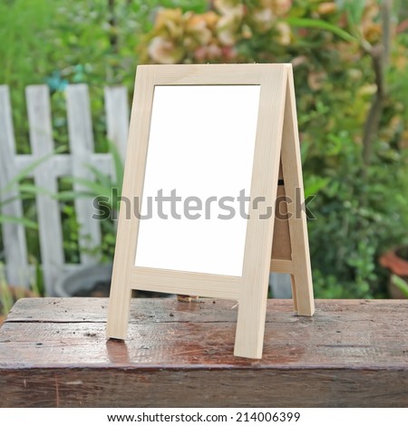 empty Wooden Whiteboard (menu board) at a coffee Shop .frame