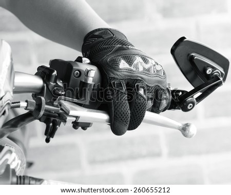 Human hand in a Motorcycle Racing Gloves Ready to ride