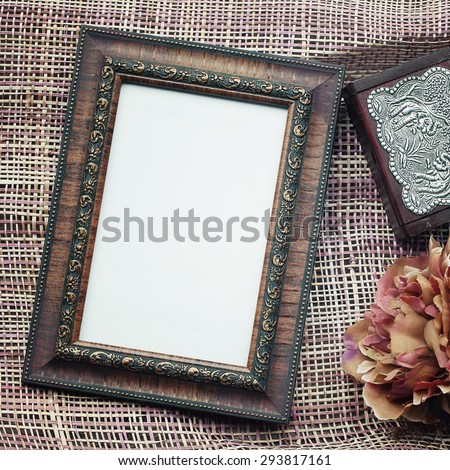 Antique wooden frame With antique wooden box.