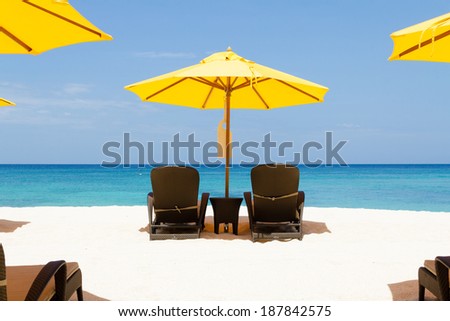 Yellow sun umbrellas and beach chairs on beach,boracay,Philippines