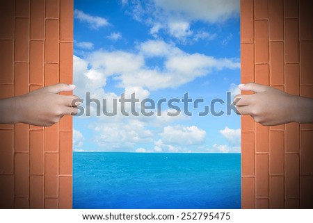 Two hands to open the door sea background