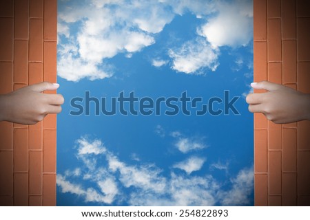 Two hands to open the door sky background