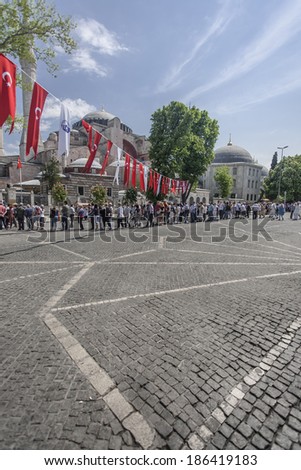 ISTANBUL, TURKEY - MAY 17, 2011: A line of people, wait outside Aghia Sophia in Istanbul, Turkey, on May 17, 2011, in order to get into the museum and see the sights.