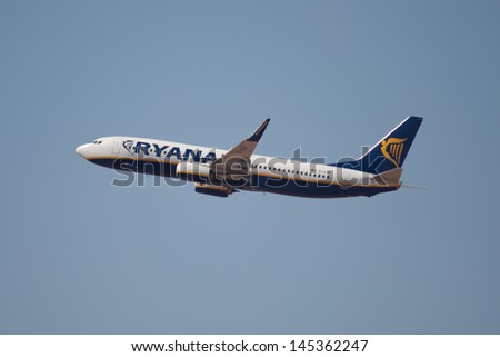 Valencia, Spain - July 8: A Ryanair Aircraft Just After Takeoff From The Valencia, Spain Airport On July 8, 2013 In Valencia, Spain. Ryanair Is The Biggest Low-Cost Airline Company In The World.