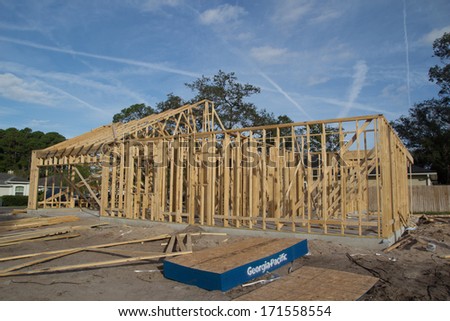 JACKSONVILLE, FLORIDA, USA-SEPTEMBER 11, 2013: A new home under construction in Jacksonville. New home sales fell 6.6 percent in September to a 354,000 annual rate, the weakest since April 2012.