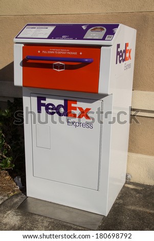 JACKSONVILLE, FL-MARCH 8, 2014: A FedEx Express drop box in Jacksonville. FedEx Express is the world\'s largest express transportation company and delivers packages to nearly every country each day.