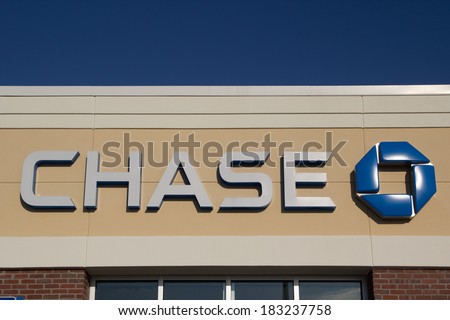 JACKSONVILLE, FL - MARCH 9, 2014: A Chase logo at a bank branch in Jacksonville. Chase bank is a US bank with more than 5,100 branches and 16,100 ATMs nationwide.