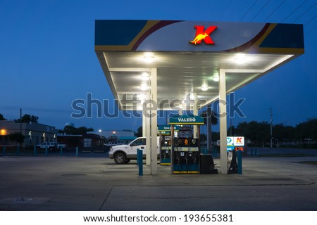 JACKSONVILLE, FL-MAY 17, 2014: A Kangaroo Express store gas station at night. The Pantry Inc company operates the Kangaroo Express stores with 1,537 stores in thirteen states.