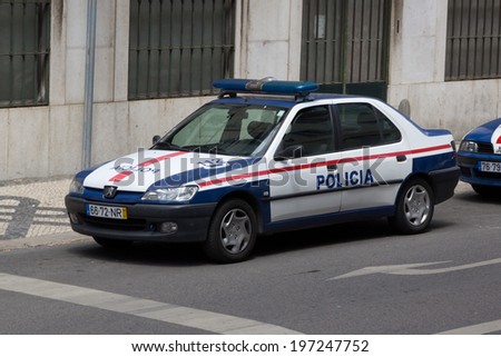 LISBON, PORTUGAL - MAY 26, 2014: Public Security Police (PSP) car on the street in Lisbon. PSP is the national Portuguese police force. The PSP is generally known for policing urban areas.