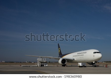 VALENCIA, SPAIN - JUNE 13, 2014: An UPS aircraft at the Valencia airport.  UPS is one of largest package delivery companies worldwide with 397,100 employees and USD 54.1 billion revenue (2012).