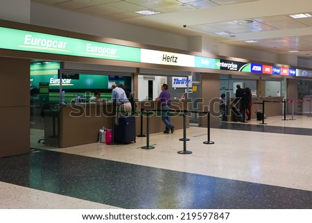 VALENCIA, SPAIN - SEPTEMBER 25, 2014:  Rental car counter at the Valencia Airport. Approximately 4.98 million passengers passed through the Valencia airport in 2013.