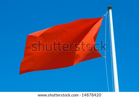 Red warning flag at the beach