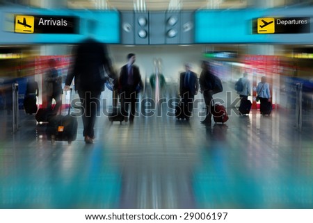 Business People at the Airport Moving with Blur