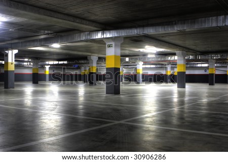 A Big Empty yellow Underground Parking Garage