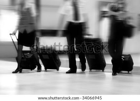 Airline Crew Luggage on Flight Crew Walking In The Airport Stock Photo 34066945