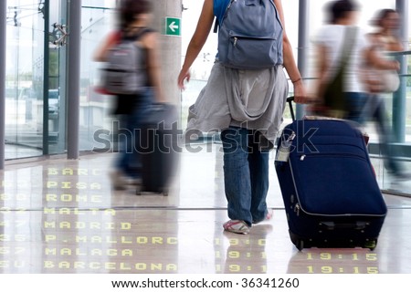 Group of Students Walking in the Airport Terminal