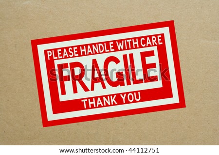 Fragile Handle with Care Sticker on Shipping Box