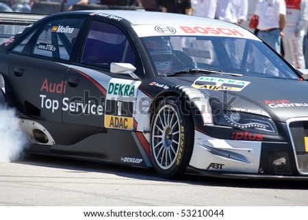 VALENCIA, SPAIN - MAY 16: 21 year old Spanish Driver Miguel Molina gives a demonstration in an Audi A4 DTM Edition in the streets of Valencia on May 16, 2010 in Valencia, Spain.