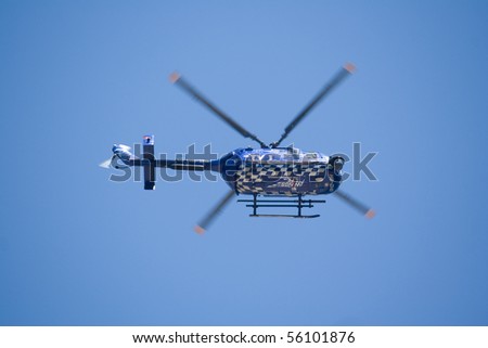 VALENCIA, SPAIN - JUNE 27: TV helicopter filming the 3rd Edition of the Formula 1 racing Valencia Street Circuit Grand Prix of Europe 2010 on June 27, 2010 in Valencia Port, Spain.