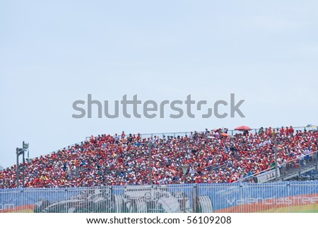 VALENCIA, SPAIN - JUNE 27: Fans watch the 3rd Edition of the Formula 1 racing Valencia Street Circuit Grand Prix of Europe 2010 on June 27, 2010 in Valencia Port, Spain.