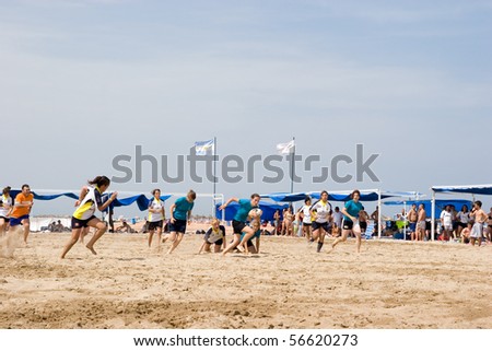 VALENCIA, SPAIN - JULY 3: Girls Rugby teams participate in the City of Valencia XIV International Beach Rugby Competition on July 3, 2010 in Valencia, Spain.