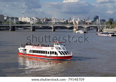 LONDON - MAY 31: City Cruises has revealed plans to build London´s largest tour boat ahead of the 2012 London Olympics. A City Cruises tour boat on the Thames River on May 31, 2011 in London, England.