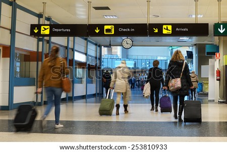 Women Airline Passengers in an Airport