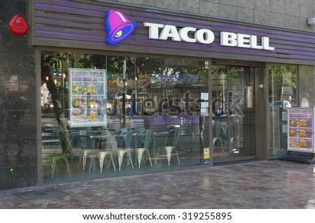 VALENCIA, SPAIN - SEPTEMBER 20, 2015: A Taco Bell fast-food restaurant in downtown Valencia. Taco Bell serves more than 2 billion customers each year in more than 5,800 restaurants.