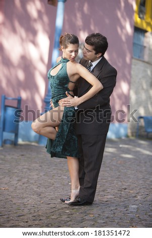BUENOS AIRES - MARCH 28, 2010: A pair of unidentified tango dancers perform on March 28, 2010 in Buenos Aires, Argentina. The tango dance originated from Buenos Aires and Montevideo, Uruguay.