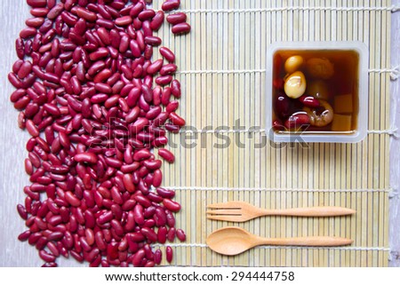 Chinese and Asian dessert beans and preserved fruits in hot sirup