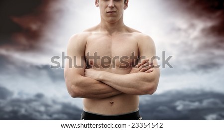A man torso at cloudy sky