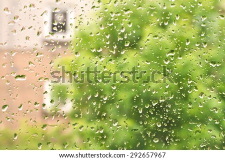 Rain drops in the window glass