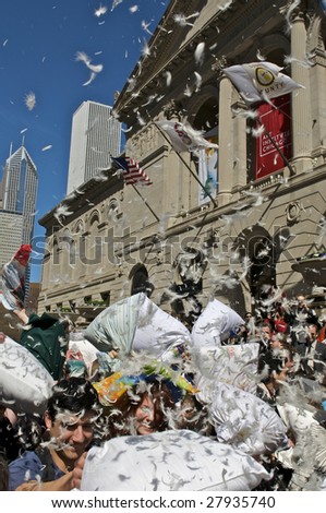 CHICAGO, IL - APRIL 4: Chicago residents join in World Pillow Fight Day in front of the Art Institute April 4, 2009 in Chicago, IL. Similar fight was held in more than 70 cities all around the world.