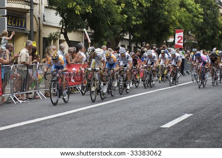 PERPIGNAN, FRANCE - JULY 8: The peloton chases the race leader towards the finish in Stage 5 of the 2009 Tour de France on July 8, 2009 in Perpignan, France.