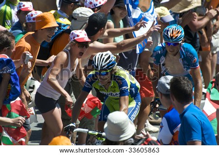 COL DU TOURMALET, FRANCE - JULY 12: Two of the leaders climb the Col du Tourmalet in Stage 9 of the 2009 Tour de France on July 12, 2009 in France.