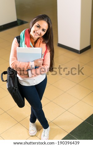 Beautiful young student, full body portrait.