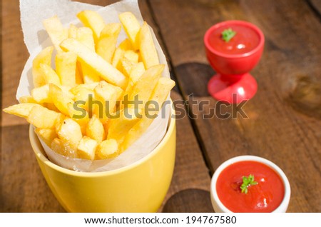 Golden French fries potatoes, ready to serve