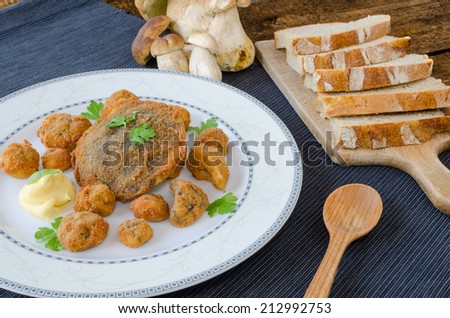 Fried mushrooms with home made bread, mushrooms from czech woods