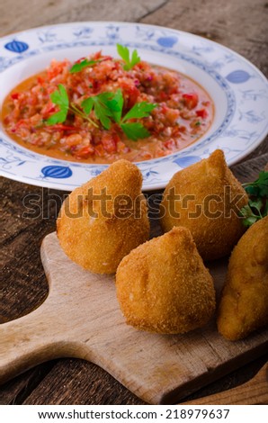 Street food is popular the world over, but the Brazilians is the best.Creamy chicken filling coated in a chicken dough then breadcrumbs - fried perfect and hot tomato salsa