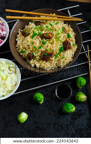Asian chicken noodles salad, fresh onions, sprouts and spring onions