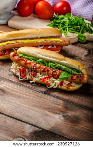 Variation on the red hot dogs, onion tomato, arugula and chilli peppers with chinese noodles